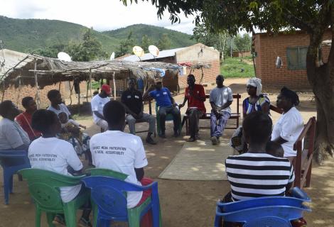 A Reflect Action Cycle meeting in Mzokoto, Rumphi