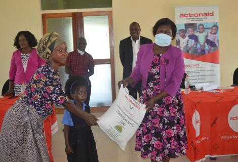 ActionAid Malawi Vice Board Chairperson, Professor Dorothy Nampota (right) making a symbolic presentation of the donation to ECD centre