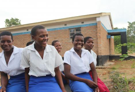 Eftasi Mugara (2nd Right)  relaxing with her classmates outside the hostel 