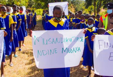 Learners in Ntchisi in a solidarity walk for gender-responsive public services