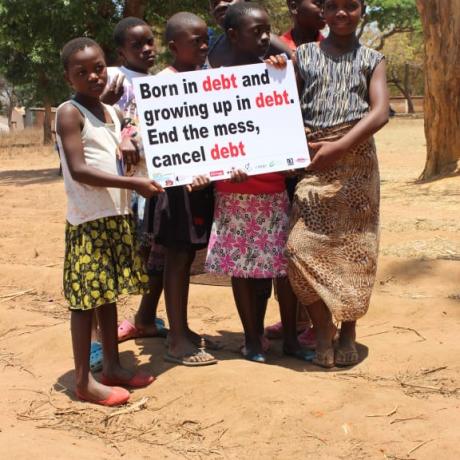 Children calling for debt cancellation on the sidelines of the campaign activity in Nsalu, outskirts of Lilongwe