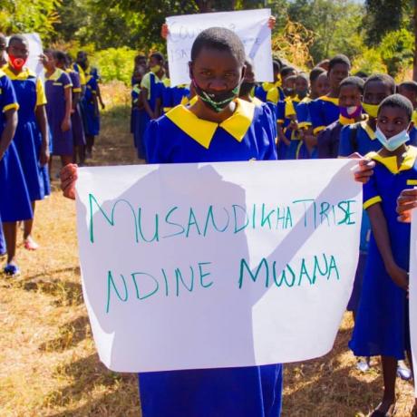 Learners in Ntchisi in a solidarity walk for gender-responsive public services