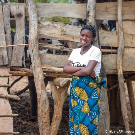 Empowered: Catherine standing in front of her goat kraal
