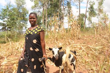 Matiana with the goat she bought with proceeds from the VSLA