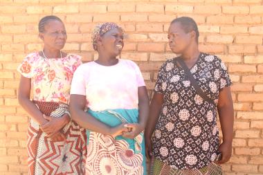 Alone but not lonely: Elisa with members of Rumphi Women Forum